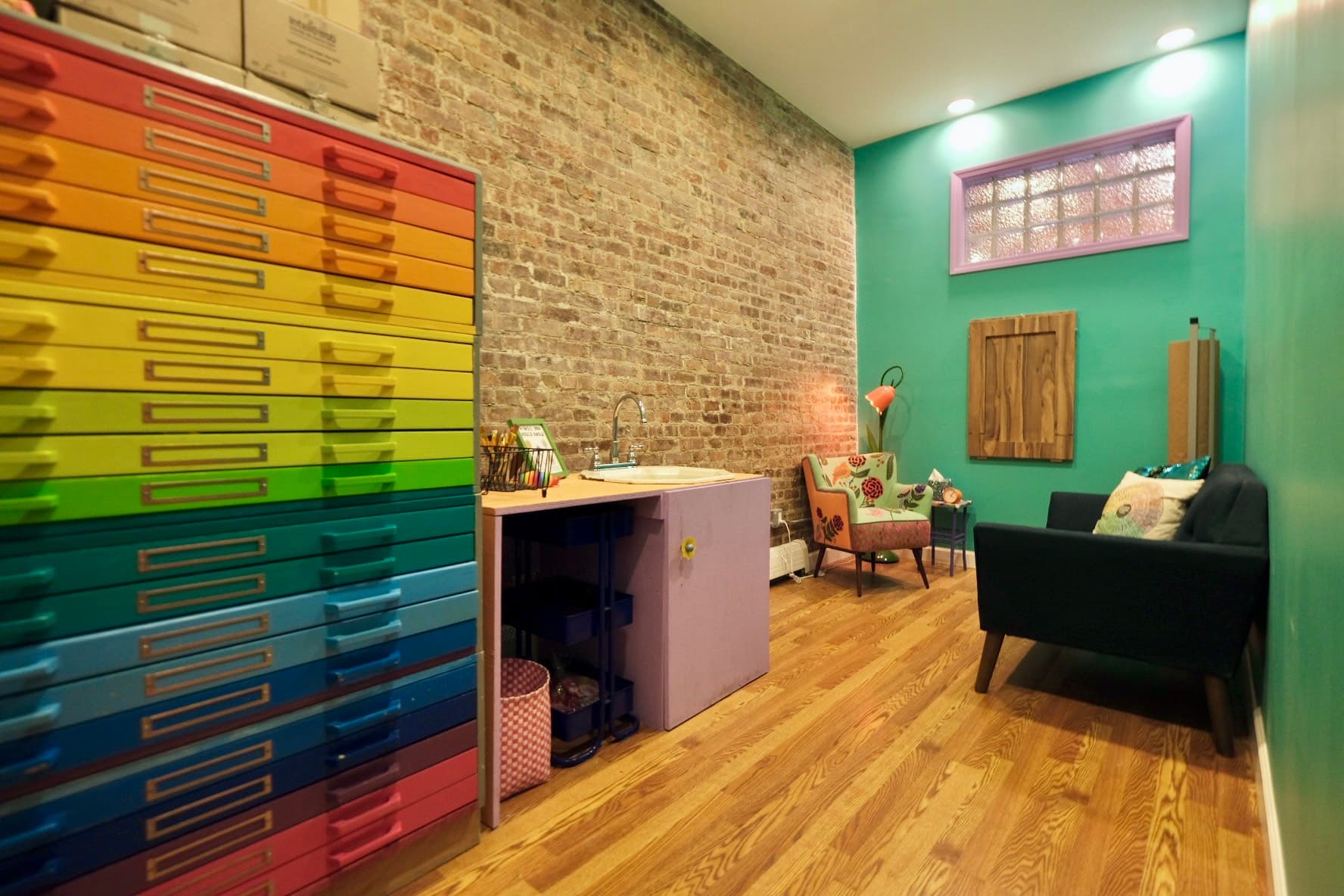 Blue room prepared for art therapy sessions